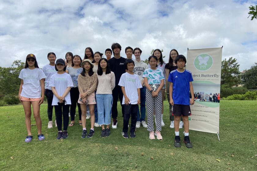 Area students, including several from The Bishop's School in La Jolla, help tutor people in China in English skills.