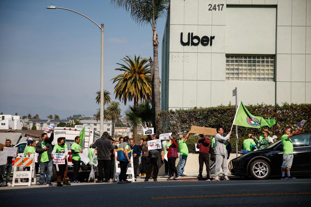 Rideshare Drivers United demonstrated in front of the Uber Greenlight Hub on Valentines Day in Los Angeles.