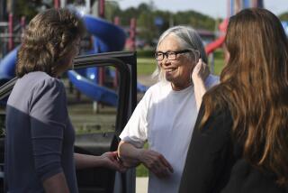 Sandra Hemme, center, meets with family and supporters after she was released from Chillicothe Correctional Center, Friday, July 19, 2024, in Chillicothe, Miss. Hemme's murder conviction was overturned after she served 43 years in prison, despite objections from Missouri’s attorney general. (HG Biggs/The Kansas City Star via AP)