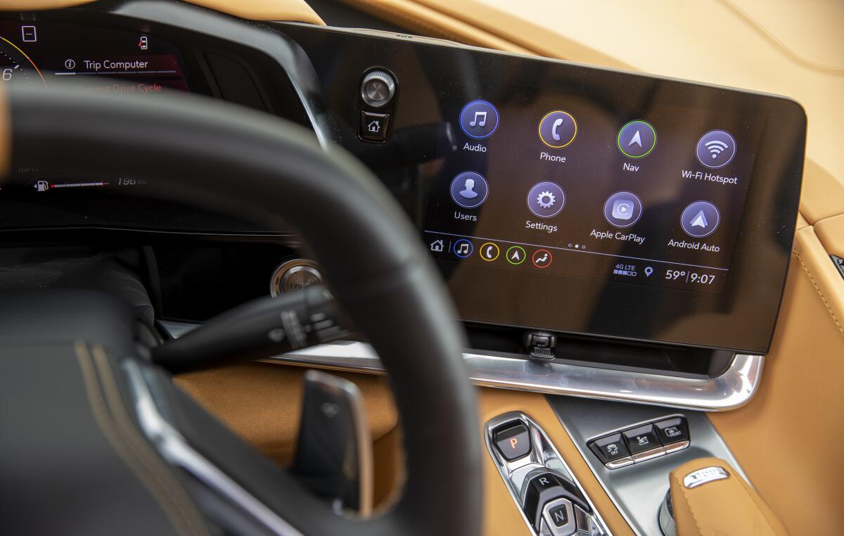 The interior of the 2020 Corvette Stingray Coupe features an 8-inch touchscreen and a 10-speaker Bose sound system.