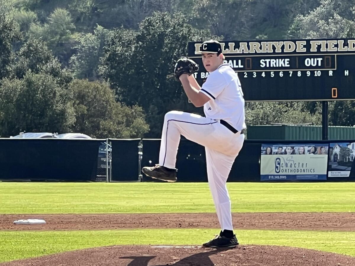 Junior pitcher Jordan Kingston winds up to deliver a pitch.