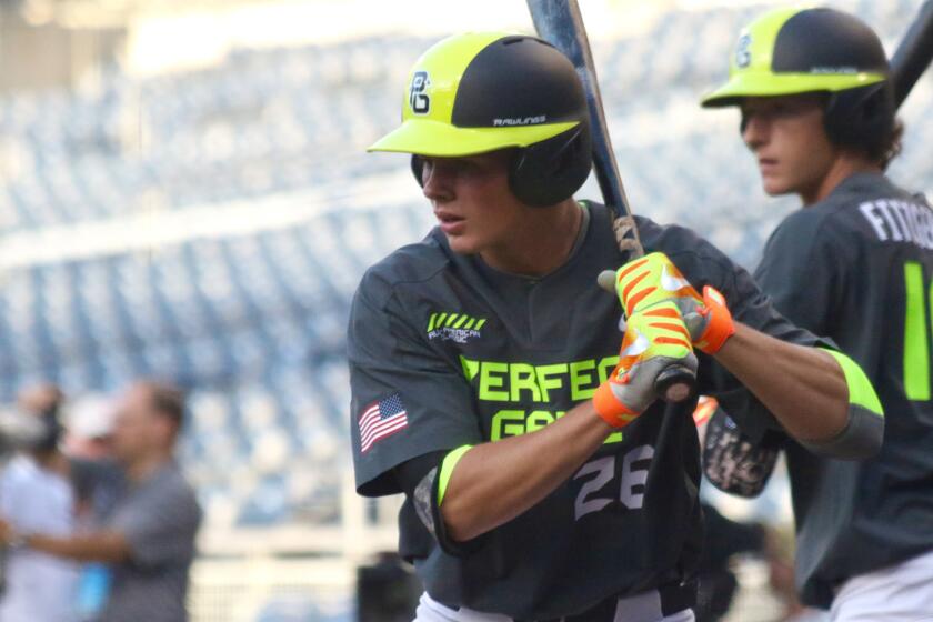 Gavin Lux warms up before the Perfect Game All-American Classic in San Diego.