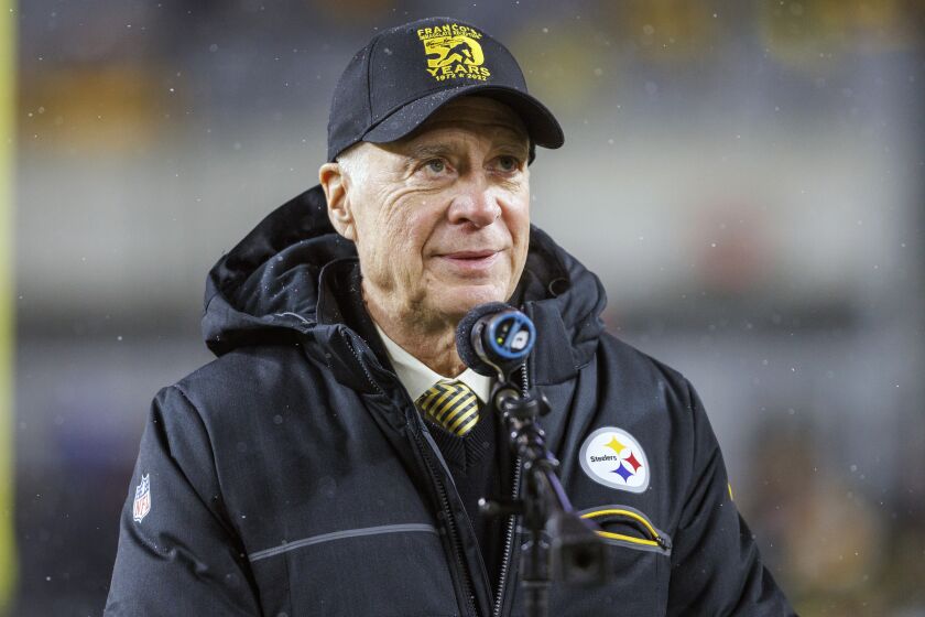 FILE - Pittsburgh Steelers' president Art Rooney II addresses the crowd during the jersey retirement ceremony of Franco Harris during halftime of an NFL football game, Saturday, Dec. 24, 2022, in Pittsburgh. Art Rooney II wants the Pittsburgh Steelers to score more points. He's confident the partnership between offensive coordinator Matt Canada and quarterback Kenny Pickett can make it happen. (AP Photo/Matt Durisko, File)