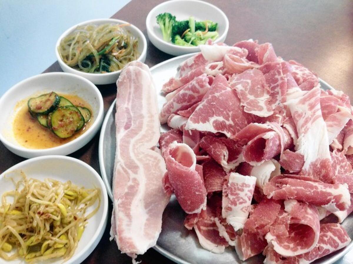 Ka-San Korean BBQ in La Crescenta serves all you can eat buffet with unlimited brisket and pork served with sides including kimchee, Korean noodles, broccoli, salad and rice noodles.