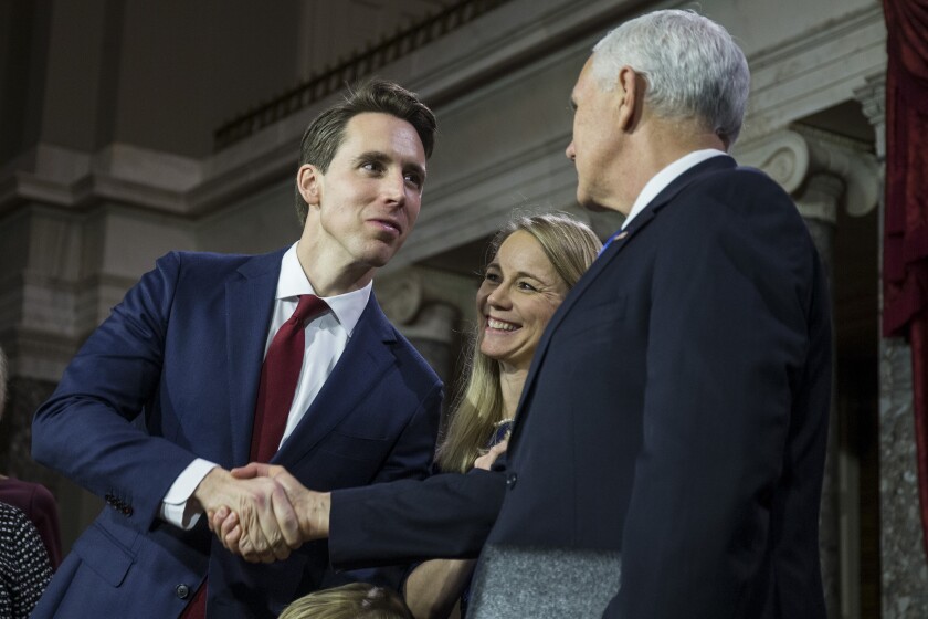 Sen. Josh Hawley (R-Mo.) with Vice President Mike Pence in 2019 in Washington, D.C. 