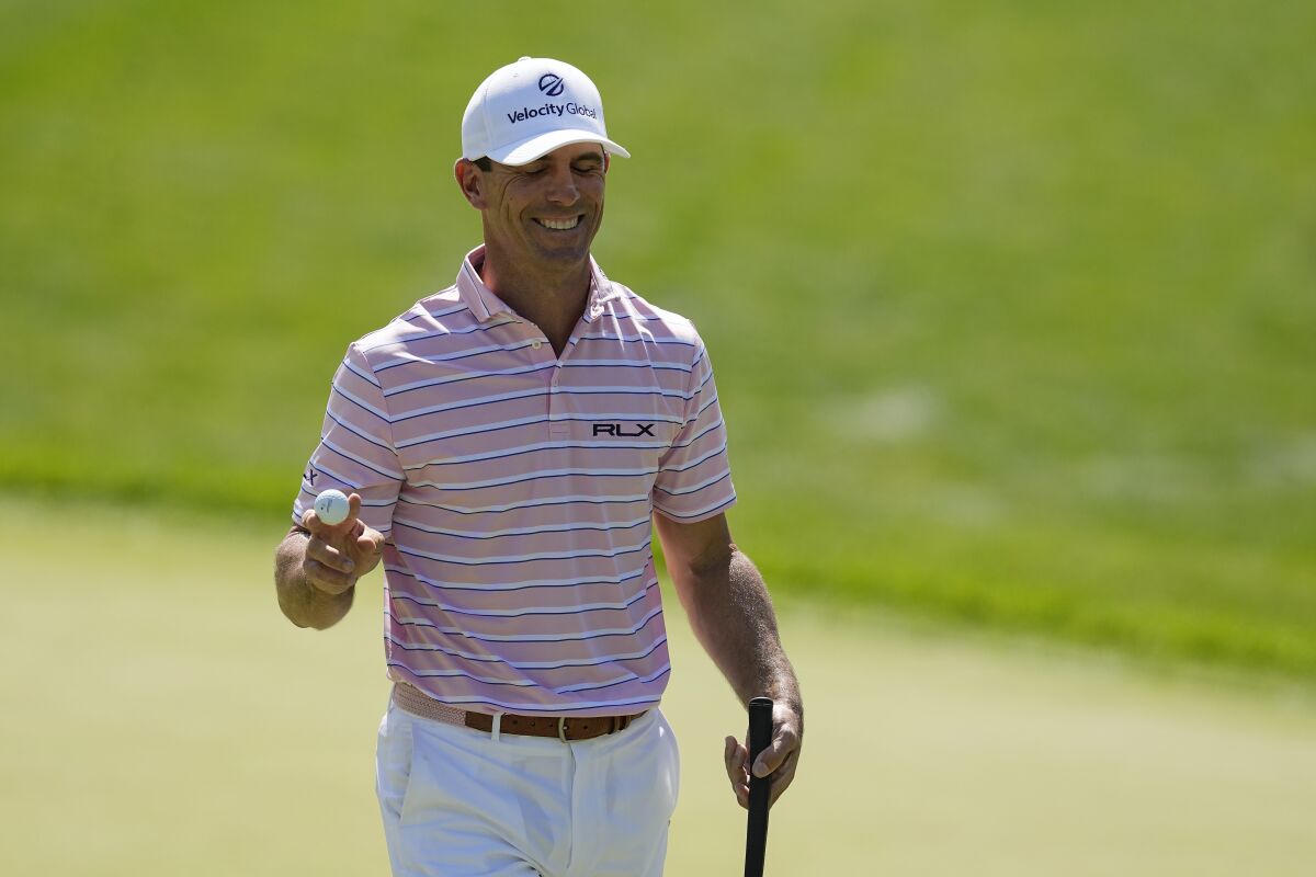 Billy Horschel leaves the 13th green after sinking a birdie putt during the third round of the Memorial on June 4, 2022.