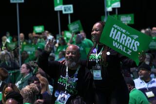 LOS ANGELES, CA - AUGUST 13, 2024 - AFSCME members show their support for Vice President Kamala Harris and Governor Tim Walz at the AFSCME's 46th International Convention in Los Angeles on August 13, 2024. (Genaro Molina/Los Angeles Times)