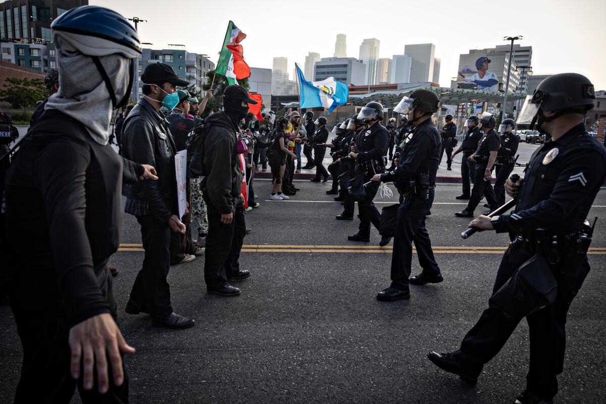 Protesters continue to clash with the Los Angeles Police Department in downtown Los Angeles.