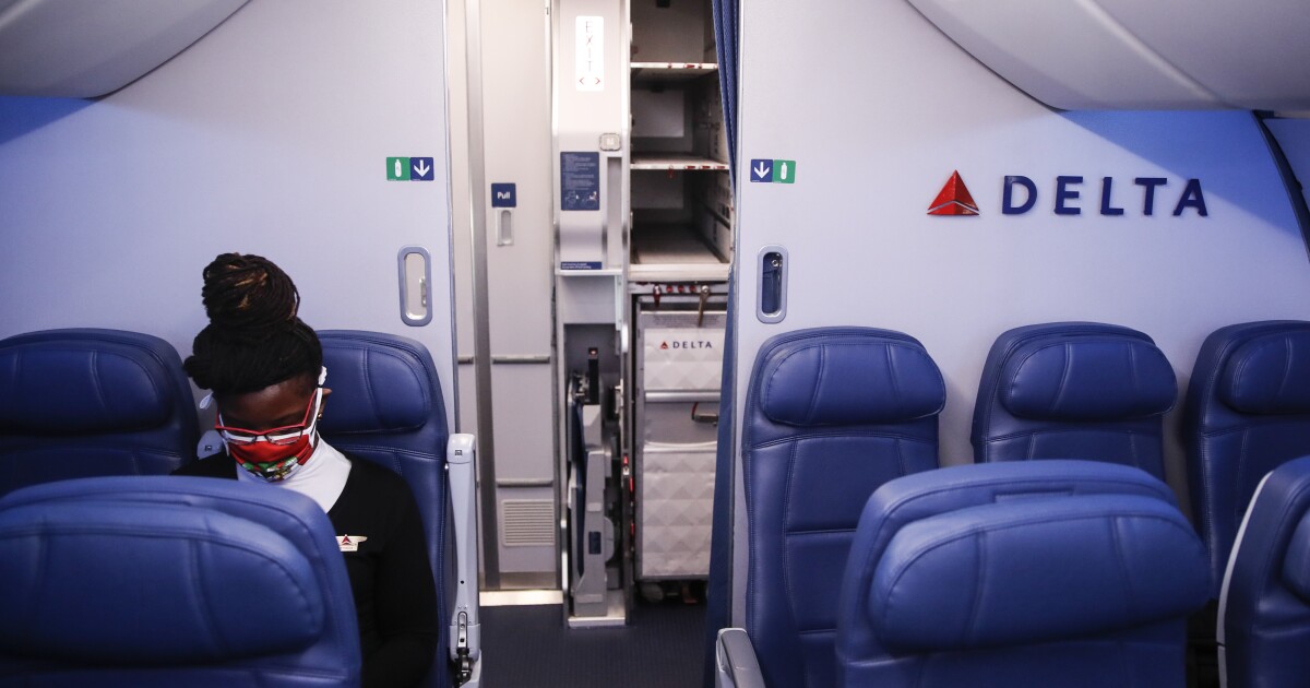 Delta hikes rates for unvaccinated. It's a slippery slope - Los Angeles Times