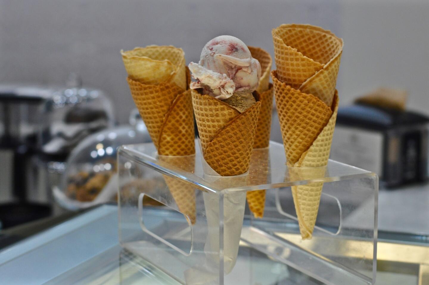 A waffle cone filled with plum ice cream and espresso ice cream at Gelateria Ulli in downtown L.A.