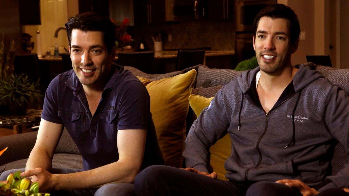 Jonathan Scott, left, and his twin brother, Drew, of the HGTV series "Brother vs. Brother" will perform "The Scott Brothers House Party," their first live variety show, in Costa Mesa on July 23.
