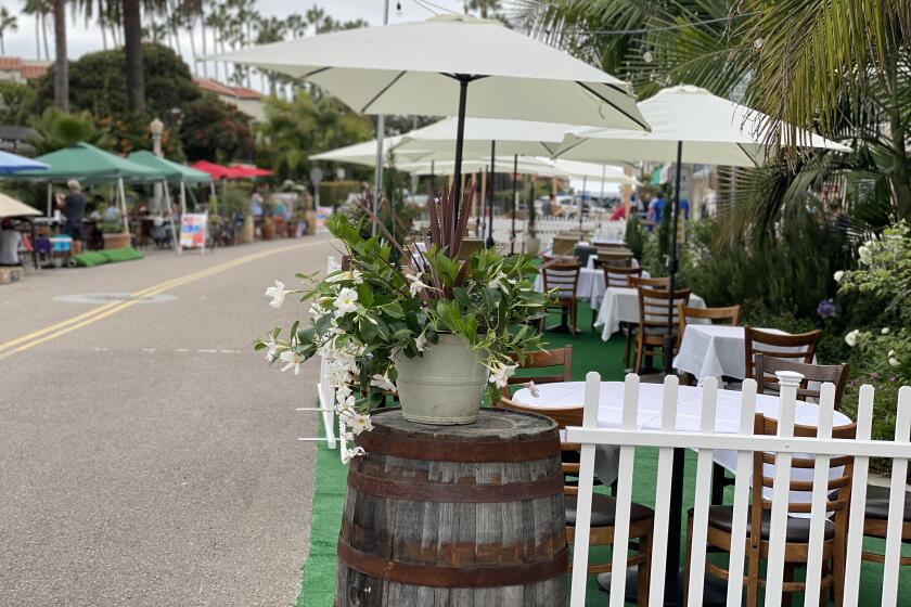 Restaurants in the Shores have decorated their outdoor seating areas along Avenida de la Playa.