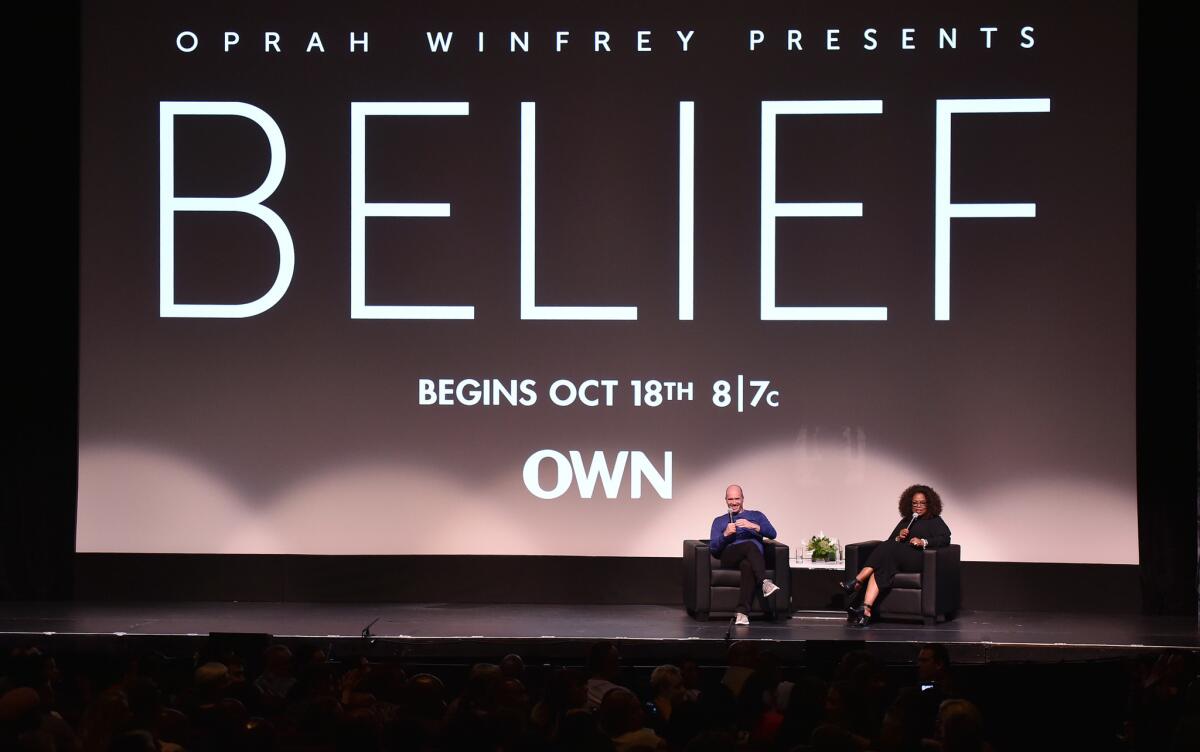 Oprah Winfrey, right, and Ben Horowitz, left, on stage at the Fox Theatre in Redwood City, CA for a special screening of the film "Belief."