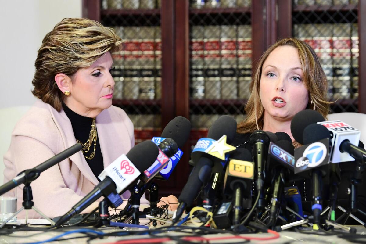 Attorney Gloria Allred, left, and client Louisette Geiss speak during a news conference at Allred's office on Tuesday.
