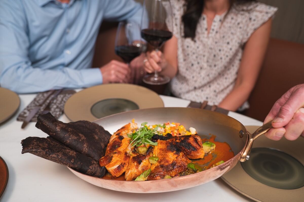 A dish served tableside at Ponto Lago restaurant at the Park Hyatt Aviara in Carlsbad.