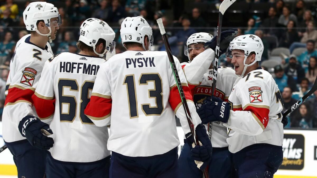 Florida Panthers' Frank Vatrano (72) is congratulated by teammates after scoring against the San Jose Sharks on Thursday in San Jose.