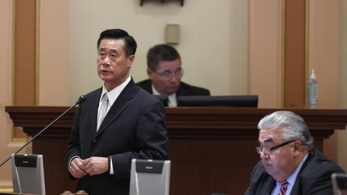 Then-state Sen. Leland Yee, left, and then-Sen. Ron Calderon in 2014, before both men were suspended with pay over corruption charges.