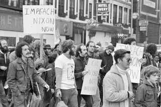About 200 demonstrators paraded downtown Boston, Oct. 23, 1973 to urge the impeachment of President Nixon. The marchers said they were a coalition of groups who have banded together to for the Committee to Remove Our President. (AP Photo/J. Walter Green)