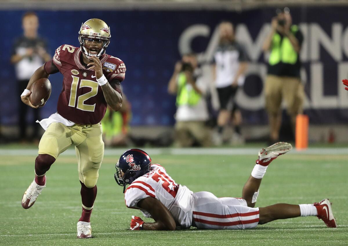 Florida State quarterback Deondre Francois (12) runs with the ball in the second half against Mississippi.