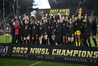 Portland Thorns FC celebrates with the trophy after winning the NWSL championship game against the Kansas City Current