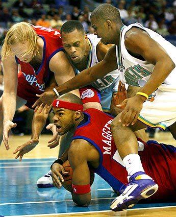 COREY MAGGETTE, CHRIS PAUL, P.J. BROWN