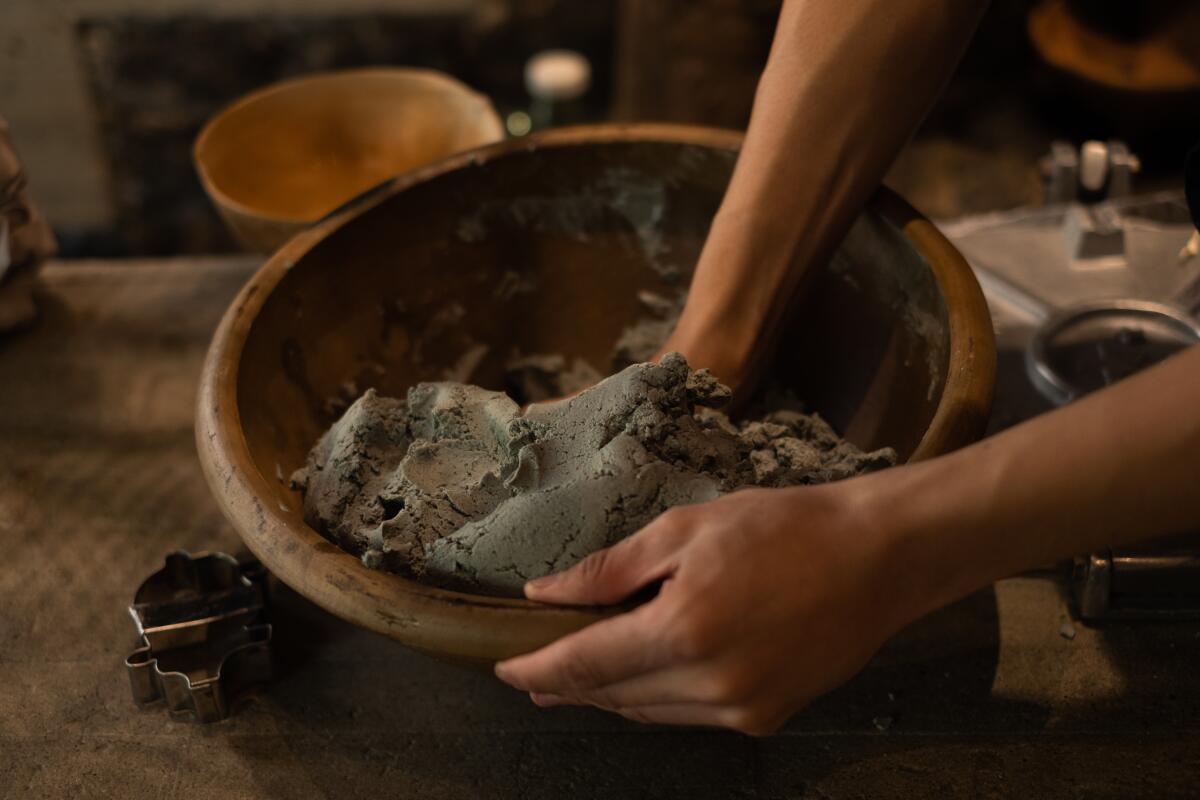 Blue corn masa is prepared to make tortillas at Expendio.