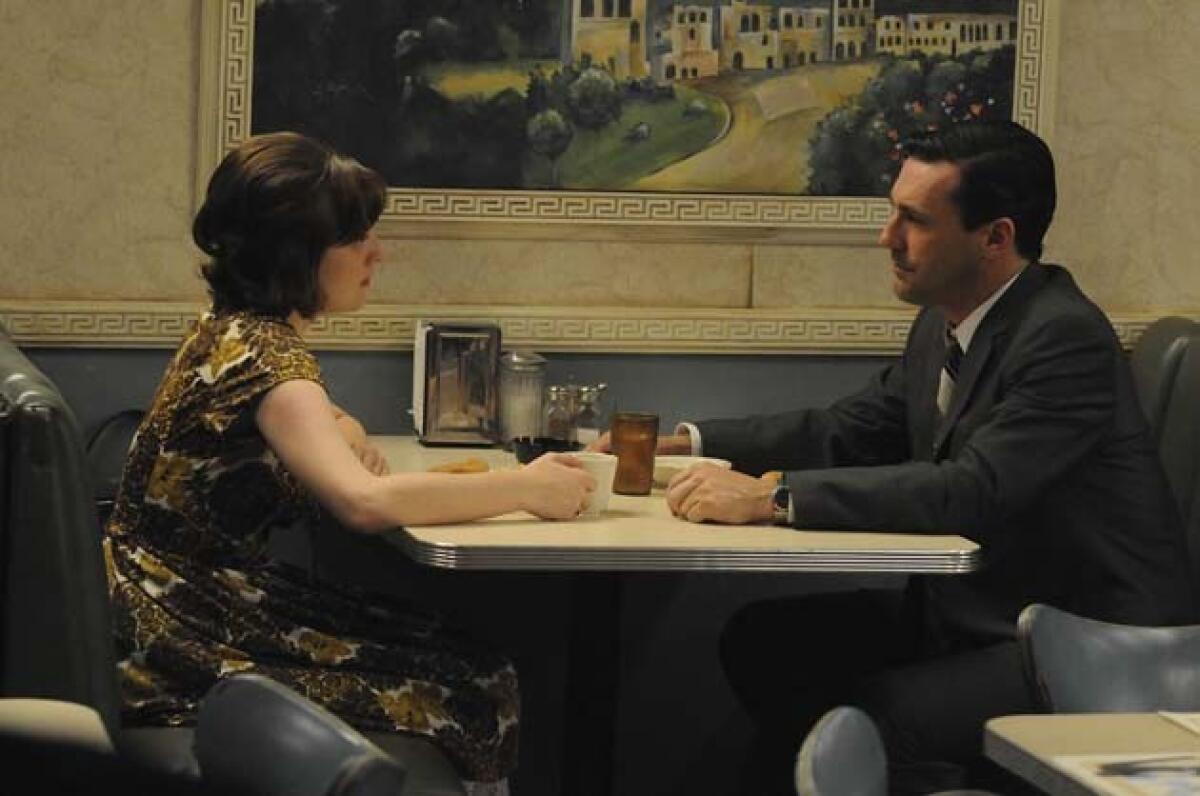 Peggy Olson (Elisabeth Moss) and Don Draper (Jon Hamm) - Mad Men - Season 4, Episode 7 - Photo Credit: Michael Yarish/AMC