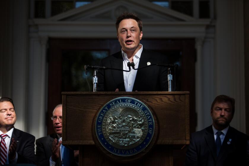 Elon Musk, chief executive of Tesla Motors, speaks at a Sept. 4 news conference at the Nevada State Capitol in Carson City, Nev. Musk and Gov. Brian Sandoval announced a plan to build a factory in Nevada to produce batteries for electric vehicles, providing 6,500 jobs to the state.