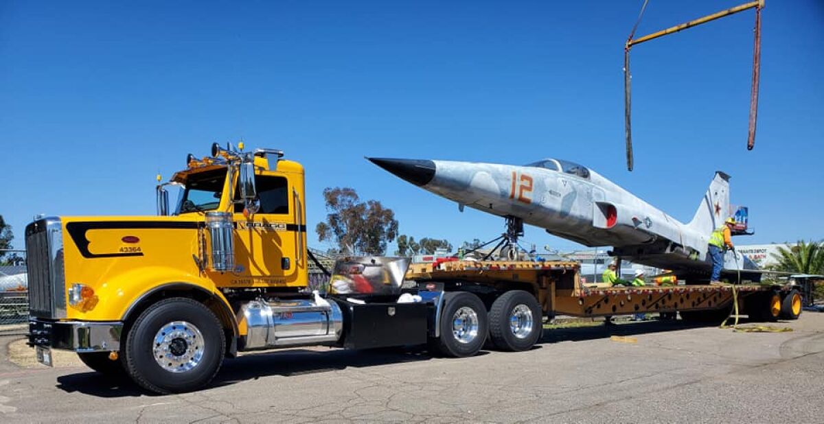 The F-5 being dismantled and transported out of the Flying Leatherneck Aviation Museum.  