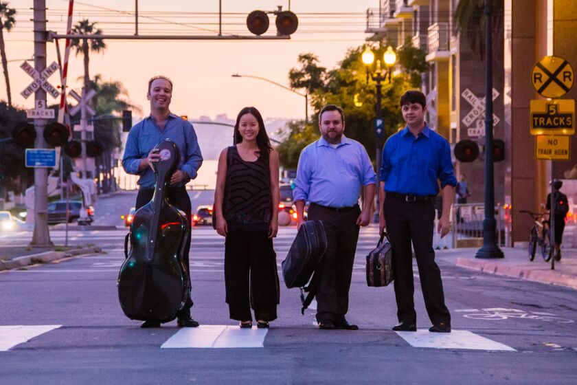 The Hausmann Quartet, from left, cellist Alex Greenbaum, violist Angela Choong and violinists Bram Goldstein and Isaac Allen.