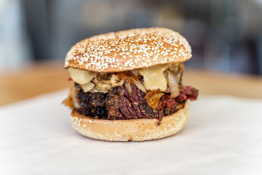 The Montreal Smoked Brisket Sandwich at Nomad Donuts in North Park 
