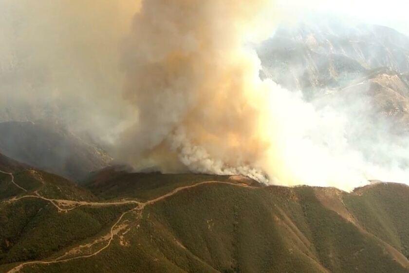 Fast-moving Silverado fire burns in hills of Cleveland National Forest.