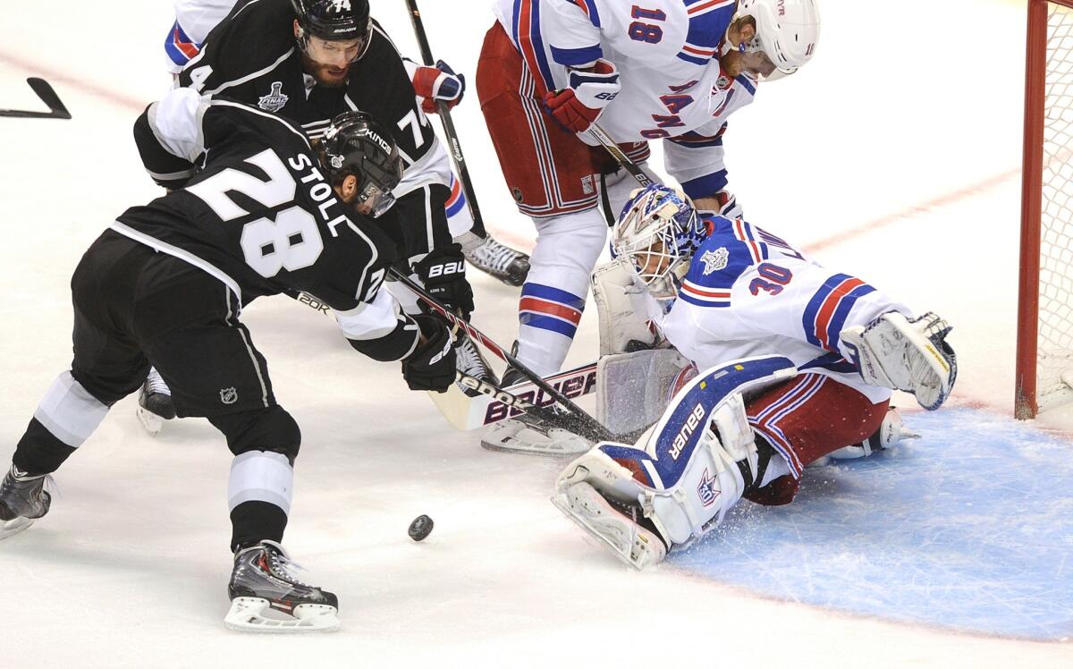 Kings center Jarret Stoll has his shot blocked by Rangers goalie Henrik Lundqvist in the first period.