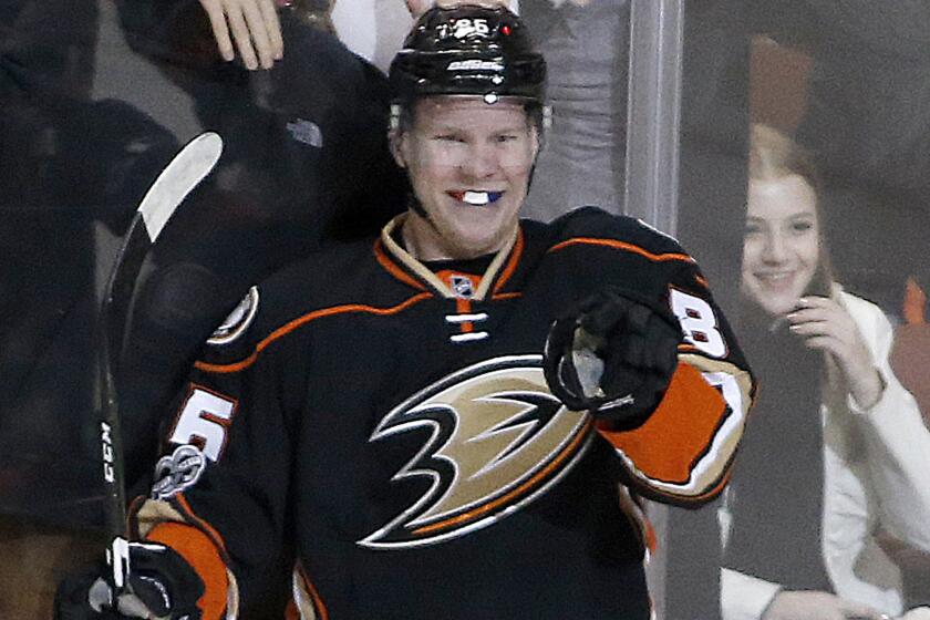 Ducks right wing Ondrej Kase is all smiles after scoring a goal against the Red Wings on Wednesday.