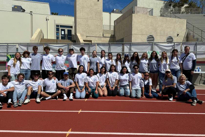 Laguna Beach high school students pose for a picture after last year's 'Walking For Water' event. The annual fundraiser has now reached its 21st anniversary.
