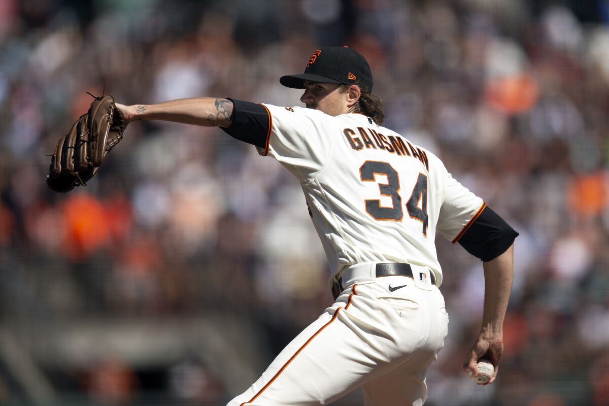 San Francisco Giants starting pitcher Kevin Gausman delivers against the San Diego Padres