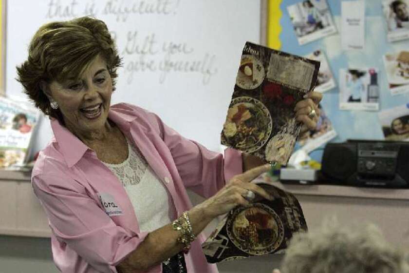 Flora Becker leads a Weight Watchers meeting in Burbank in 2007. In a new study conducted with a grant from Weight Watchers International, participants who were enrolled in Weight Watchers -- and who used the organization's resources the most -- lost the most weight.