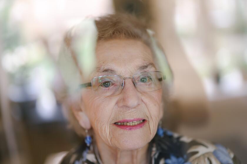 Thousand Oaks, CA - September 20: Celina Biniaz, 92, the youngest person on German industrialist Oskar Schindler's famed list of Jews saved from the Nazis in wartime Europe, sits for a portrait at home on Wednesday, Sept. 20, 2023 in Thousand Oaks, CA. The Steven Spielberg film, shot 30 years ago in Krakow where many of the actual events took place, galvanized Biniaz and many other Holocaust survivors to tell their stories publicly, and left an enduring mark on Krakow, Poland's second-largest city. (Dania Maxwell / Los Angeles Times)