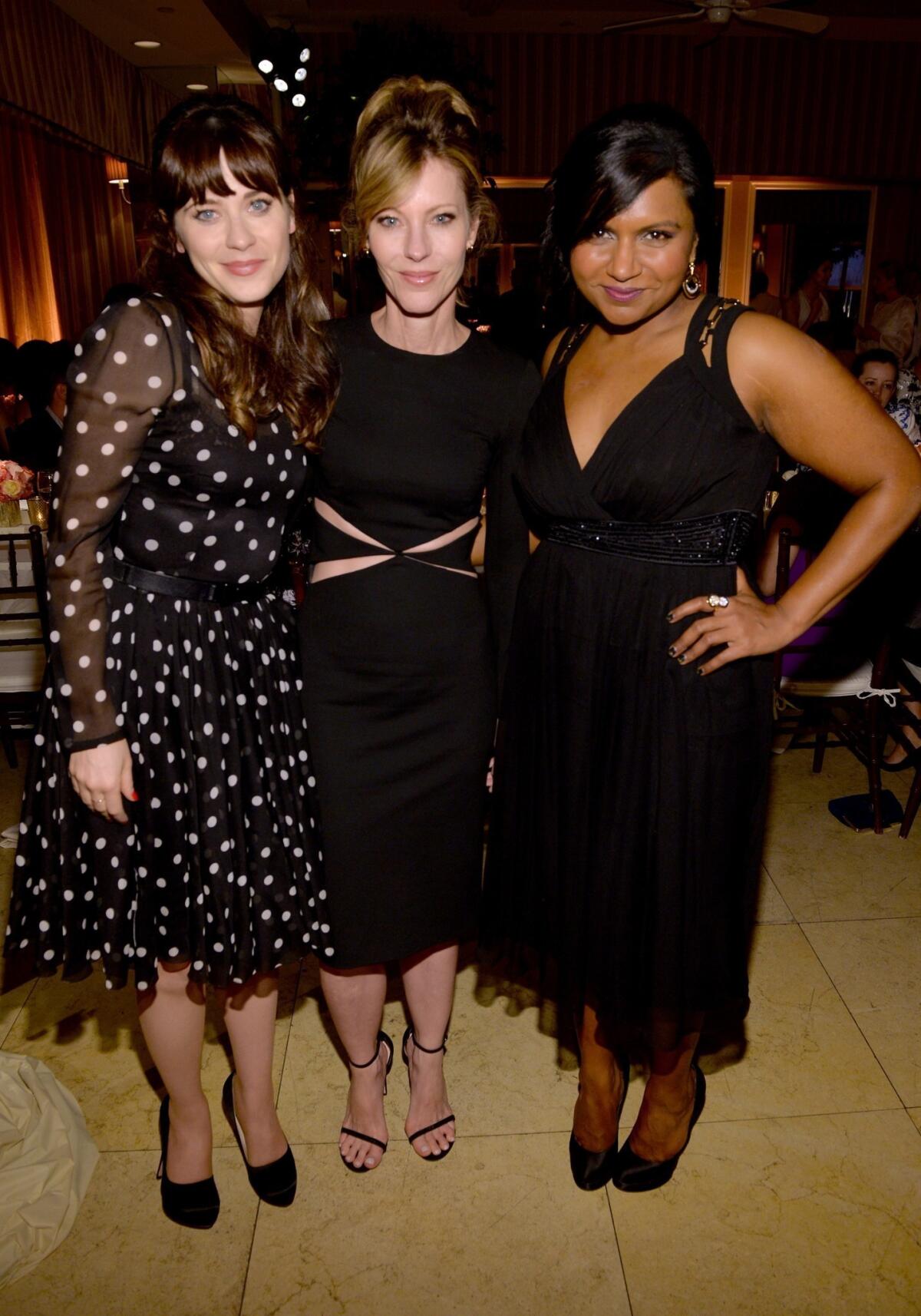 Zooey Deschanel, left, Elle Editor-in-Chief Robbie Myers and Mindy Kaling at Elle's Women in Television celebration.