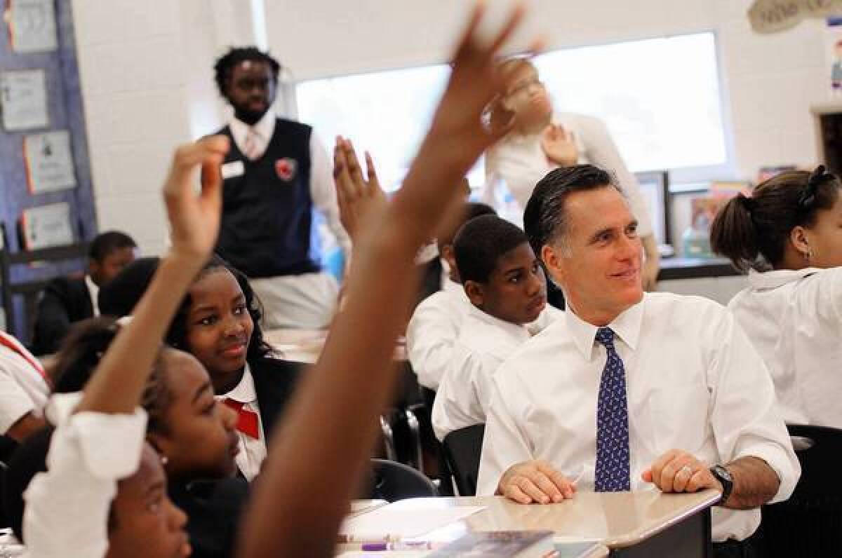 Republican presidential candidate Mitt Romney takes part in a language class at Universal Bluford Charter School in West Philadelphia.
