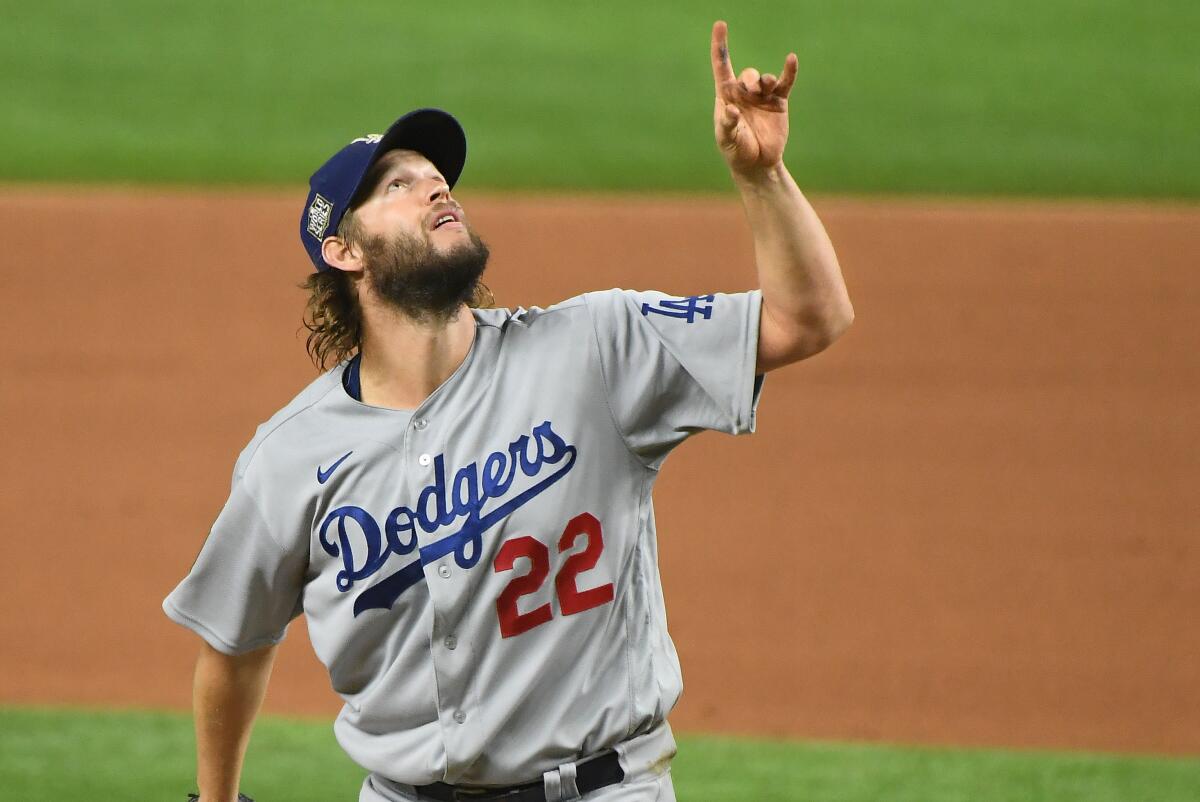 Clayton Kershaw points to a pop fly during the sixth inning in Game 5 of the World Series.