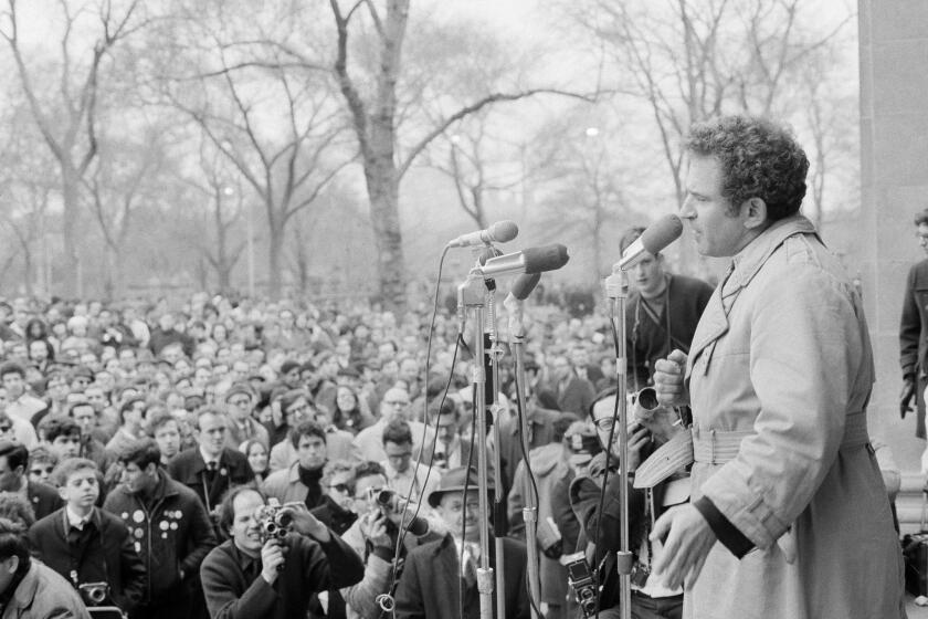 Author Norman Mailer speaks at an anti-war rally at the bandshell in New York's Central Park, in this March 26, 1966 file photo.