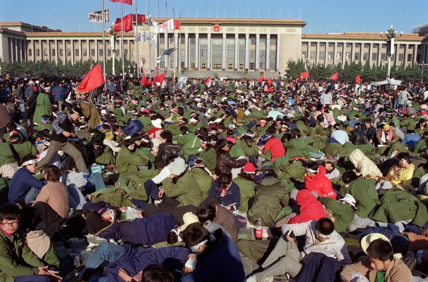 Chinese student hunger strikers lie down en masse in Tiananmen Square in May, 1989.