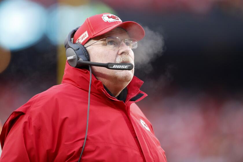 Kansas City Chiefs head coach Andy Reid looks at the score board during the first half of an NFL divisional playoff football game against the Houston Texans, in Kansas City, Mo., Sunday, Jan. 12, 2020. (AP Photo/Jeff Roberson)