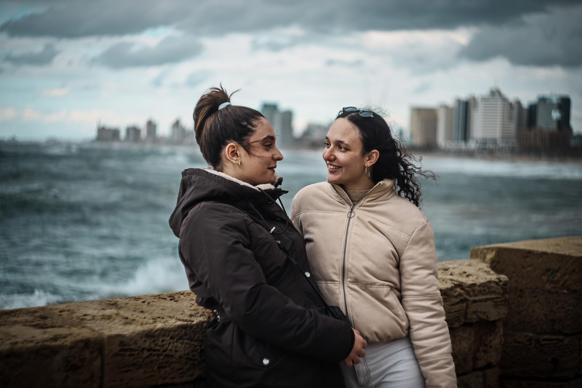 Angelina Shakkour and Adar Hirak Asaf share a moment together on a stormy day.