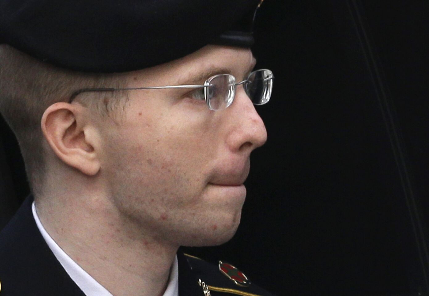 Army Pvt. Bradley Manning is escorted into a courthouse in Fort Meade, Md., before a sentencing hearing in his court martial. After the hearing, Manning announced a desire to be called Chelsea from now on and to be considered a woman.