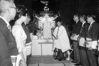 Nisei Week, August 18 1960. 'Mikoshi' presented to Los Angeles;Dito Tsuyuki (Shinto priest);Yukio Hasumi (Japanese Consul General);Akemi Tani (Nisei Week Queen);Edward Roybal (Councilman).;Caption slip reads: 'Photographer: Mitchell. Date: 1960-08-18. Reporter: Reay. Assignment: 'Mikoshi' presented to City of L.A it is a Shinto. L to r., 5/6: Japanese Consul Gen. Yukio Hasumi;Misei Week Queen Akemi Tani;Councilman Edward R Roybal. 57/58: Shinto priest Dito Tsuyuki dedicating shrine'.Los Angeles, California. (Photo by Los Angeles Examiner/USC Libraries/Corbis via Getty Images)