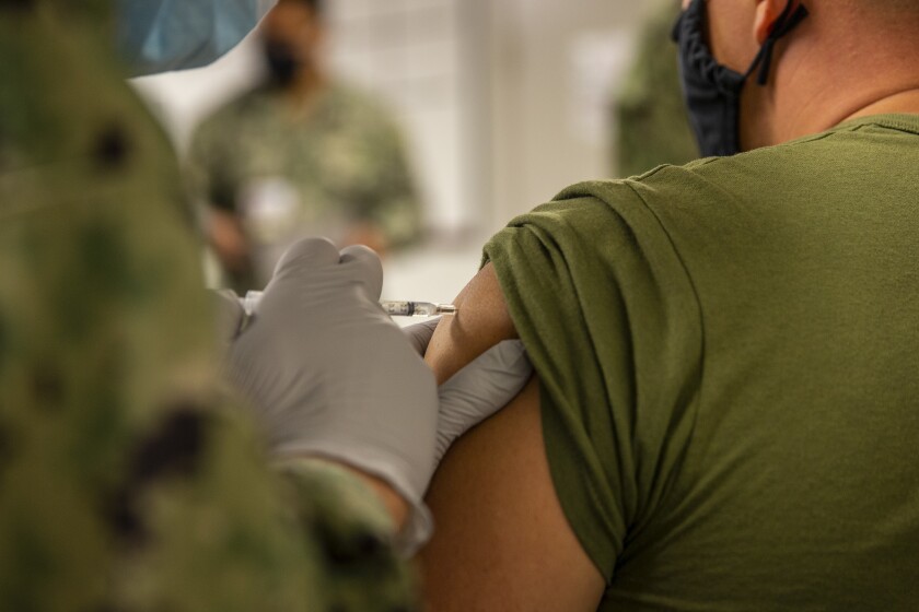 A U.S. Marine receives the COVID-19 vaccine at Camp Pendleton, California, Sept. 22, 2021.