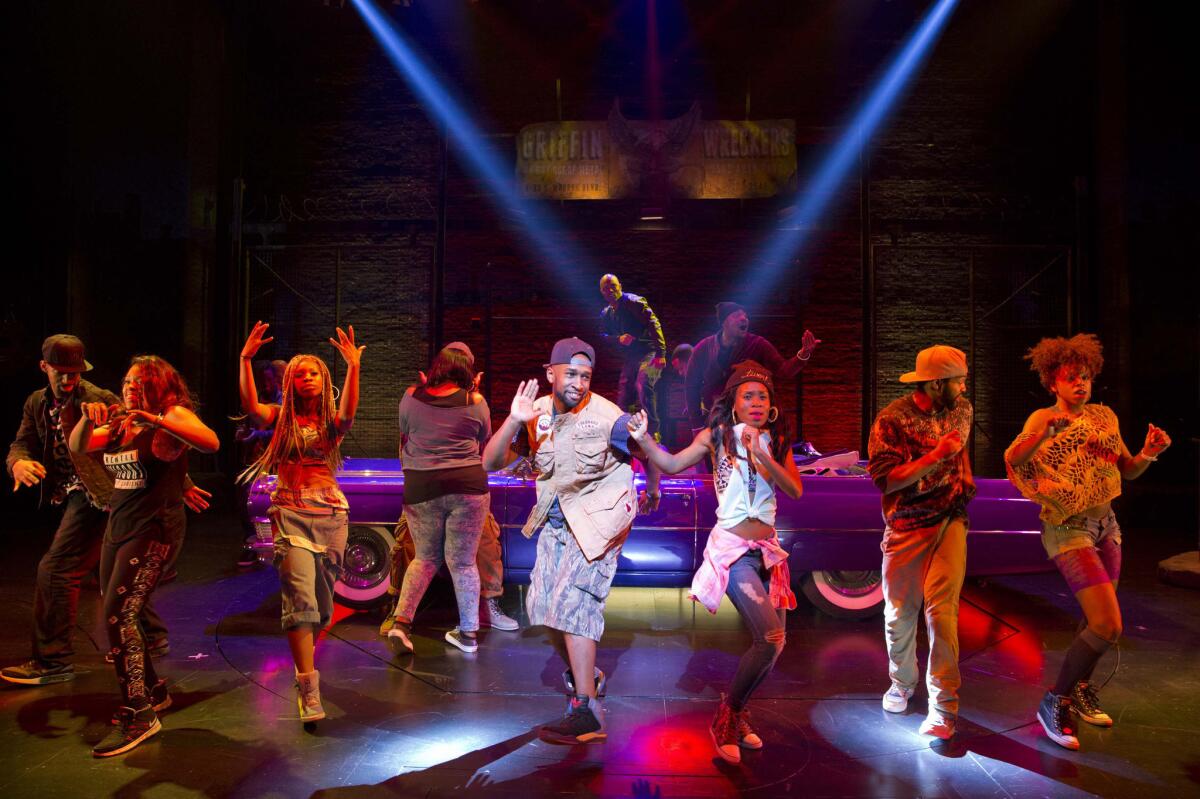 The cast of "Holler If Ya Hear Me" performs at the Palace Theatre in New York.