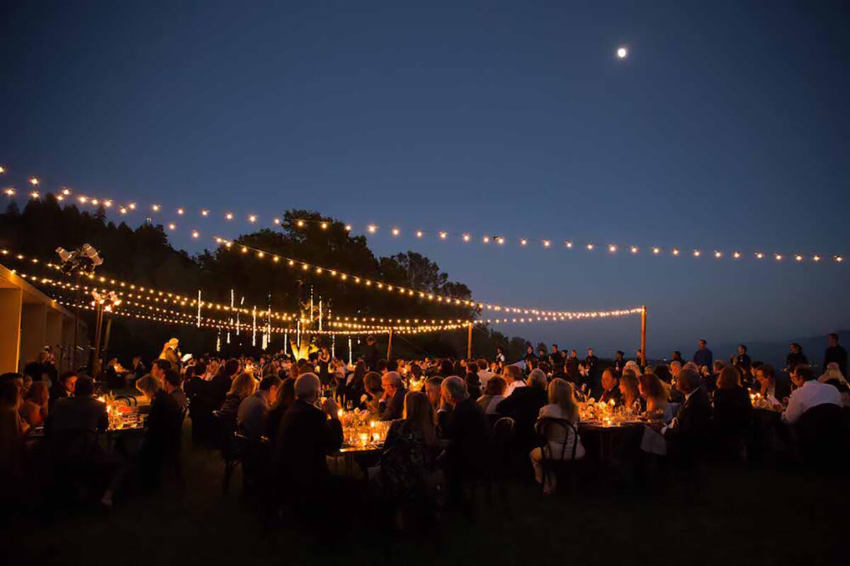 Evening falls on a backyard wedding.